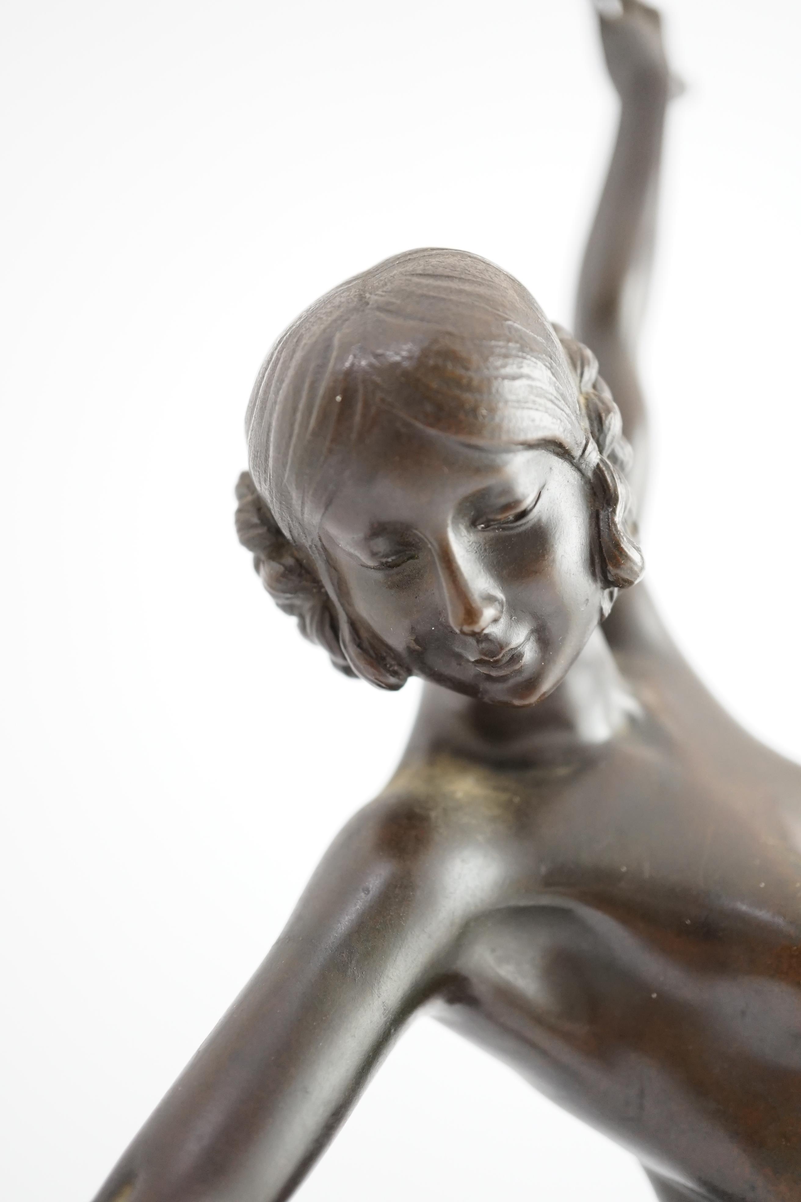 Fernand Quillon-Carrère. An Art Deco bronze figure 'Danseuse aux lances'